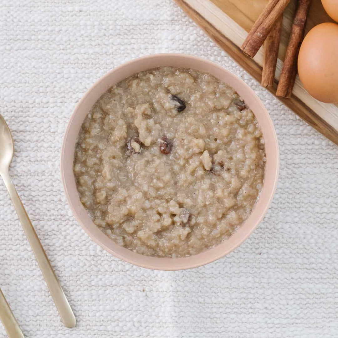 best food for postpartum a bowl of pink and brown shatavari rice pudding organic and regenerative and gluten-free