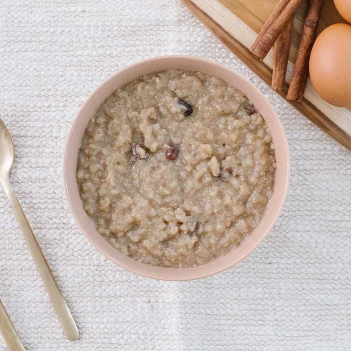 best food for postpartum a bowl of pink and brown shatavari rice pudding organic and regenerative and gluten-free