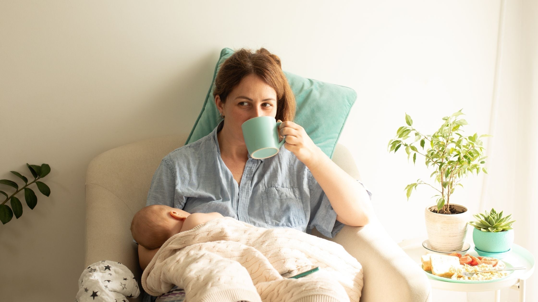 Mom drinking the best tea for postpartum